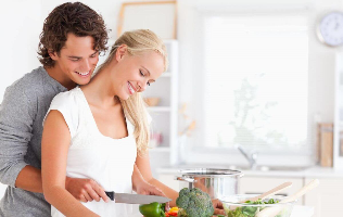 a young couple is preparing